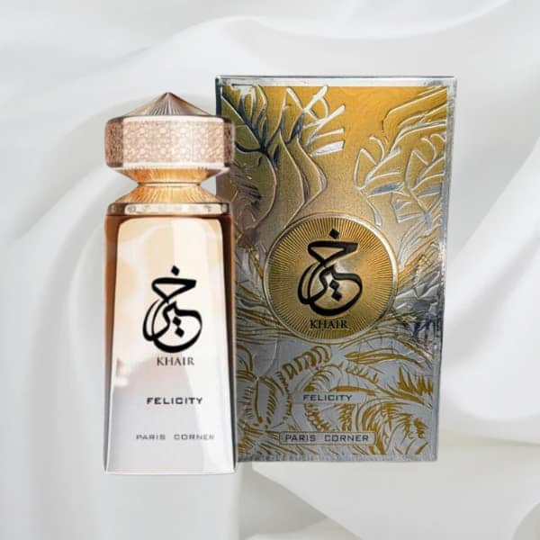 Eau de Parfum Khair Felicity - Paris Corner. Un parfum mixte raffiné, présenté dans un flacon doré élégant avec son coffret assorti aux motifs sophistiqués.”
